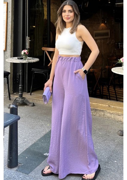 Kadın Lila Beli Lastikli, Cepli, Bol Paça Özel Kumaş, Rahat Kalıp Pantolon - Tesettüre Uygun fiyatları