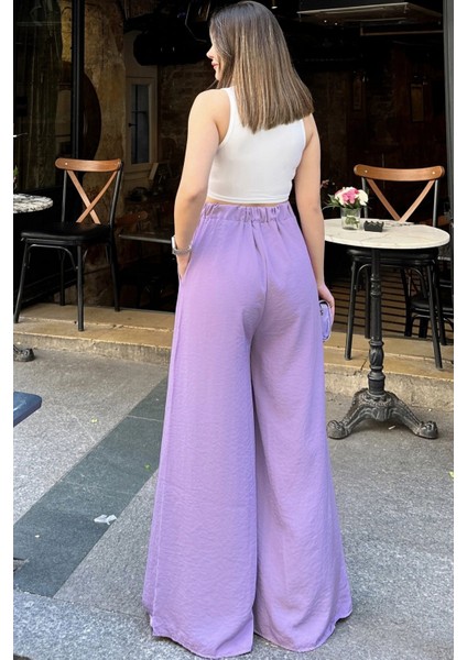 Kadın Lila Beli Lastikli, Cepli, Bol Paça Özel Kumaş, Rahat Kalıp Pantolon - Tesettüre Uygun indirimleri