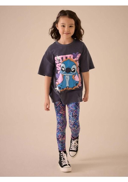 Kız Çocuk Karakter Desen Baskılı Oversize T-Shirt ve Renkli Desenli Tayt Alt Üst Takım