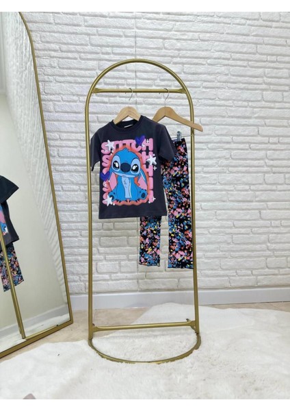 Kız Çocuk Karakter Desen Baskılı Oversize T-Shirt ve Renkli Desenli Tayt Alt Üst Takım modelleri