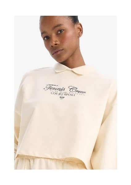DeFacto Fit Oversize Geniş Kalıp Polo Yaka Slogan Baskılı Sporcu Sweatshirt D7133AX25SP