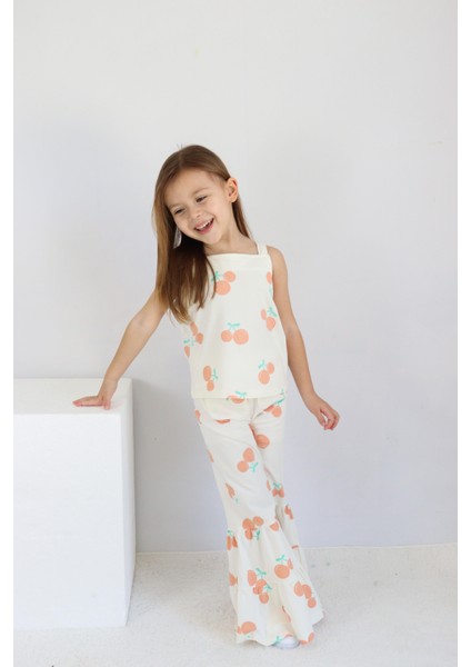 Kız Çocuk Ekru Kiraz Desenli Ispanyol Paça Pantalonlu Takım fiyatları