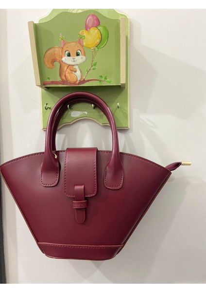 Bordo Kadın Kova Asimetrik Model El ve Çıkarılabilir Askılı Omuz Çantası modelleri