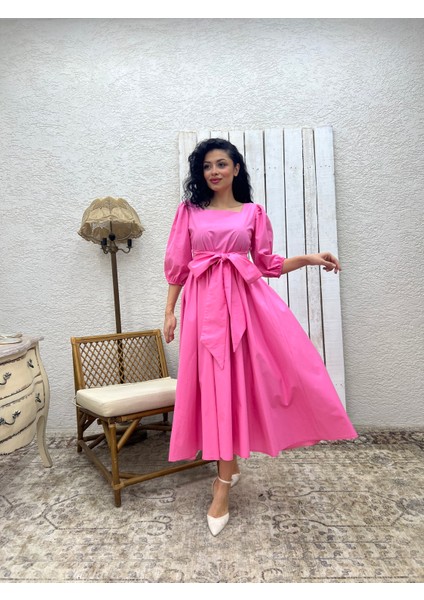 Pembe Uzun Fiyonklu Kloş Poplin Elbise modelleri