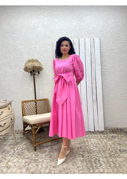 Pembe Uzun Fiyonklu Kloş Poplin Elbise indirimleri