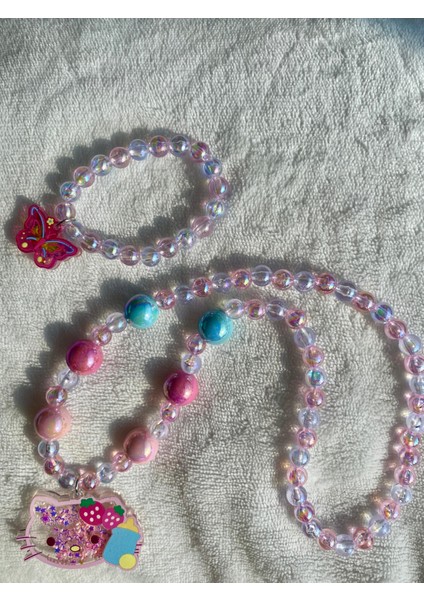 Kız Çocuk Hello Kitty Figürlü Lastikli Sim Payetli Boncuk Kolye Kelebekli Parlak Bileklik Kolye Seti modelleri