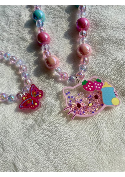 Kız Çocuk Hello Kitty Figürlü Lastikli Sim Payetli Boncuk Kolye Kelebekli Parlak Bileklik Kolye Seti indirimleri
