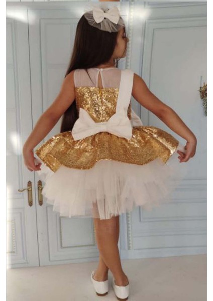 Kız Çocuk Önü ve Arkası Fiyonk Detaylı Üstü Pulpayet Işlemeli Etek Ucu Tüllü Gold Abiye fırsatları