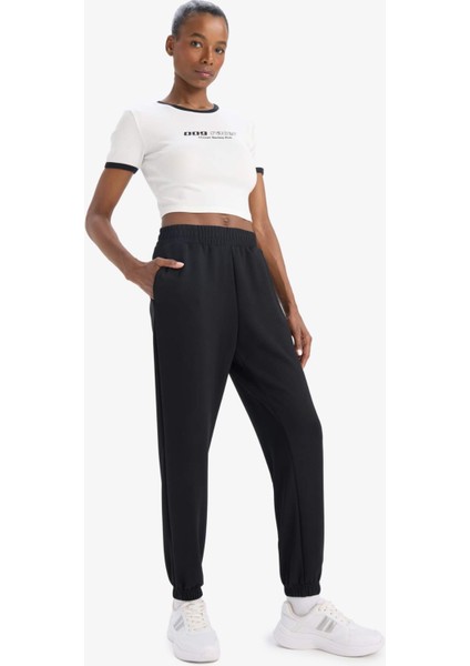 Defactofit Slim Fit Dar Kesim Bisiklet Yaka Slogan Baskılı Sporcu Ribana Kısa Kollu TIŞÖRT E4796AX25SP fiyatları