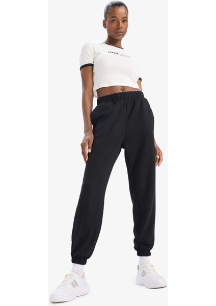 Defactofit Slim Fit Dar Kesim Bisiklet Yaka Slogan Baskılı Sporcu Ribana Kısa Kollu TIŞÖRT E4796AX25SP modelleri