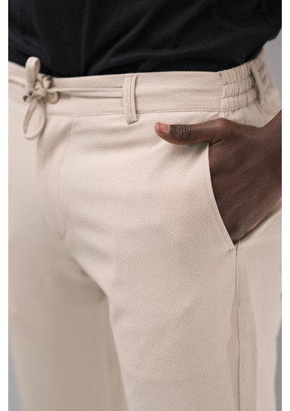 Beli Lastikli ve Iplikli Armürlü Slimfit Pamuklu Likralı Jogger Pantolon indirimleri