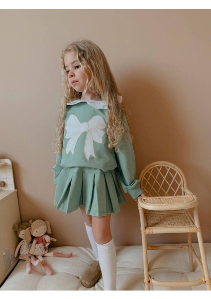 Kız Çocuk Yeşil Fiyonk Detaylı Bebe Yaka Uzun Kollu Bayramlık Etekli Takım