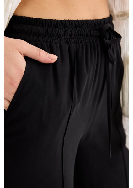 Beli Lastikli Önü Dikiş Detaylı Pantolon fırsatları