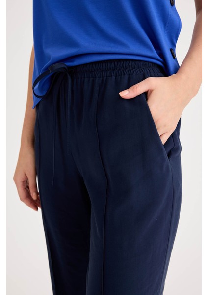 Beli Lastikli Önü Dikiş Detaylı Pantolon fırsatları