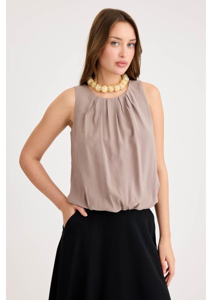 Önü Pileli Sıfır Kol Etek Ucu Lastikli Bluz fiyatları