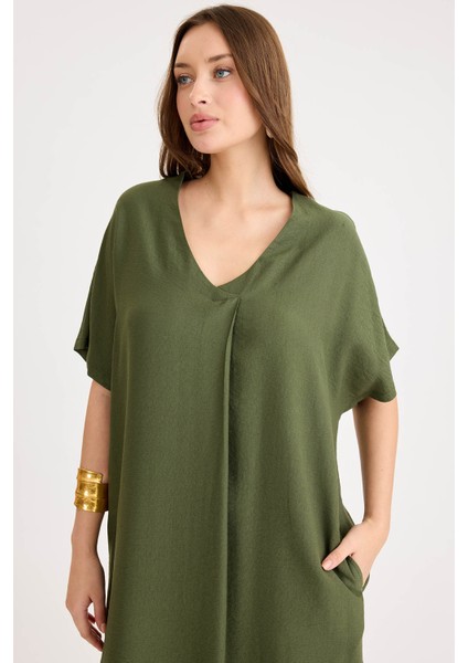 Yanları Yırtmaçlı V Yaka Kısa Kol Cepli Elbise fiyatları