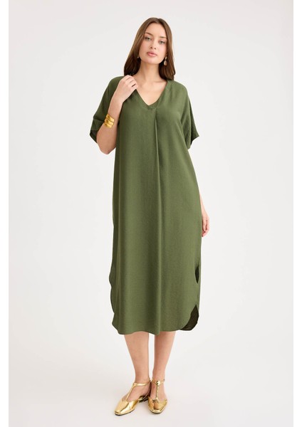 Yanları Yırtmaçlı V Yaka Kısa Kol Cepli Elbise fırsatları