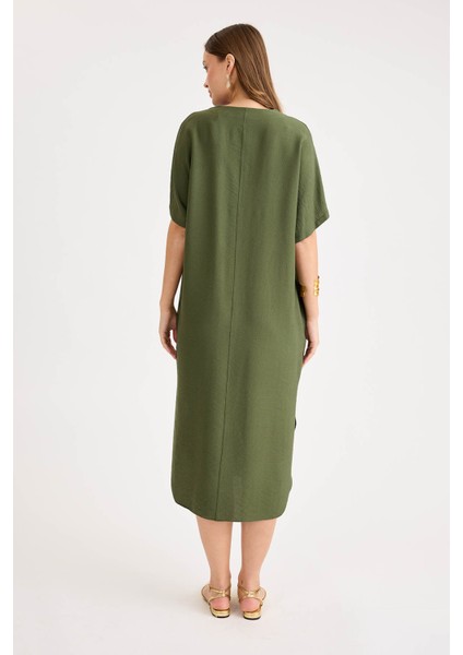 Yanları Yırtmaçlı V Yaka Kısa Kol Cepli Elbise indirimleri