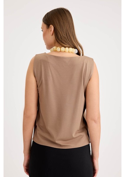 Yanları Düğmeli Sıfır Kol Modal Bluz fırsatları