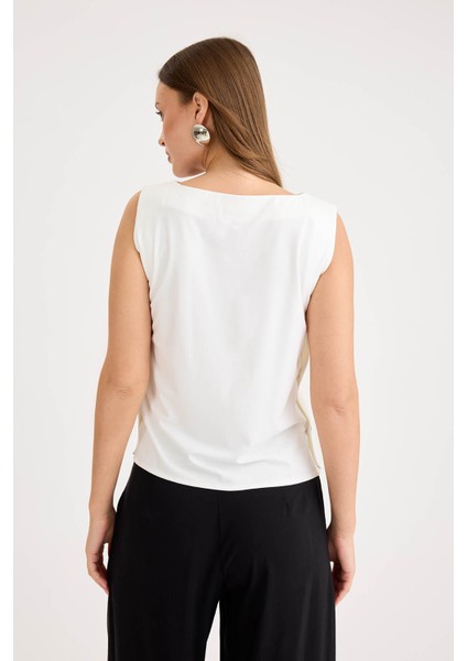 Yanları Düğmeli Sıfır Kol Modal Bluz indirimleri