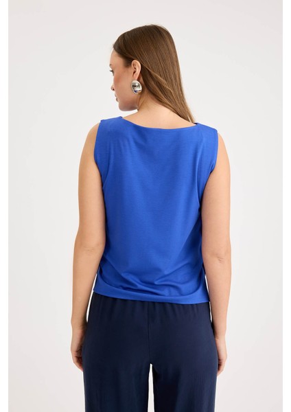 Yanları Düğmeli Sıfır Kol Modal Bluz indirimleri