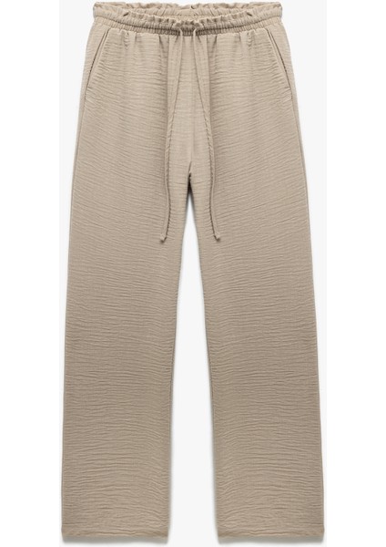 Beli Bağlamalı Lastikli Cepli Bol Paça Pantolon