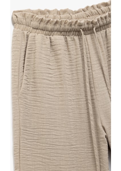Beli Bağlamalı Lastikli Cepli Bol Paça Pantolon modelleri
