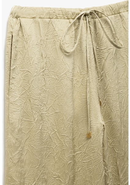 Beli Bağlamalı Yüksek Bel Geniş Paça Dokulu Saten Pantolon indirimleri