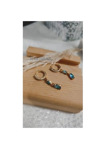 Okyanus Mavisi ve Zirkon Taşlı Çelik Küpe Göz Alıcı modelleri