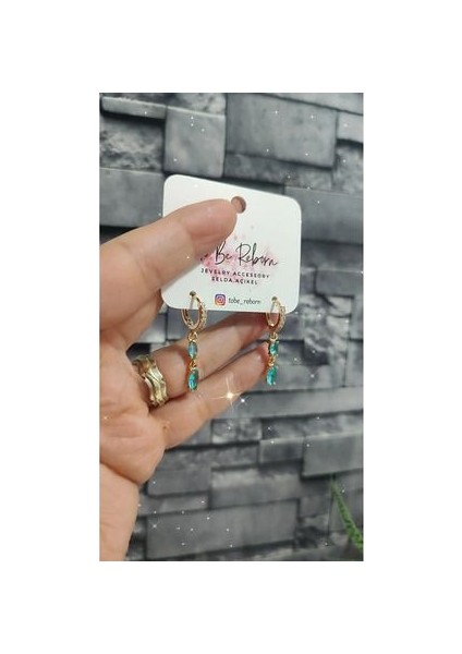 Okyanus Mavisi ve Zirkon Taşlı Çelik Küpe Göz Alıcı indirimleri