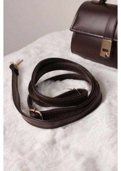 Falerya Kahve Sert Gövdeli Deri Çanta fırsatları