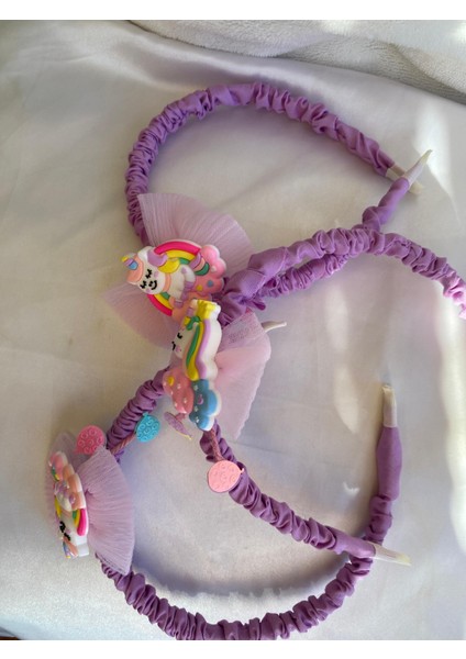 Kız Çocuk Unicorn Desenli Tül Detaylı Kumaş Kaplama Mor Renk Taç (Sticker Hediyeli) modelleri