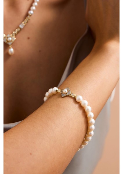 14 Ayar Altın 7 mm Baget Taşlı Doğal Inci Bileklik fiyatları