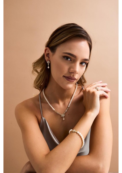 14 Ayar Altın 7 mm Baget Taşlı Doğal Inci Bileklik modelleri