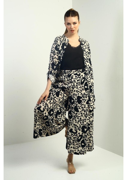 Kadın Yanları Yırtmaçlı Tunik Gömlek Beli Lastikli Cepli Palazzo Pantolon Karışık Desenli Oversize 2'li Takım fiyatları