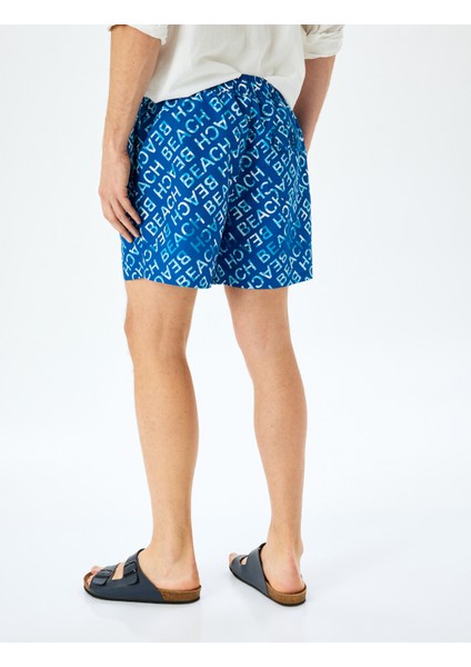 Beli Bağcıklı Baskılı Cep Detaylı Oversize Deniz Şortu fırsatları