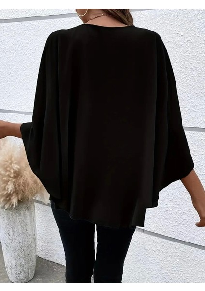 Kadın Asimetrik Pelerin Kollu Yuvarlak Yaka Salaş Sandy Bluz indirimleri