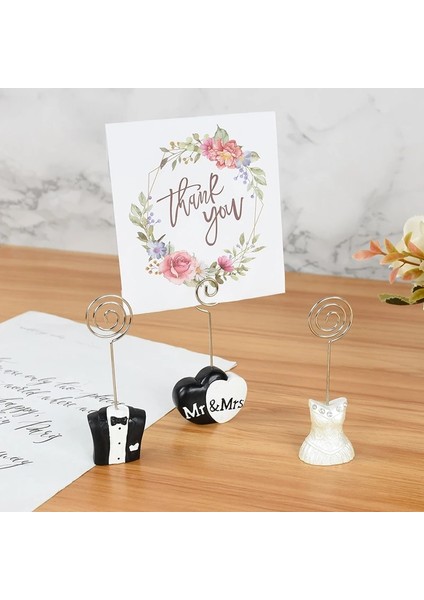 L01 Gelin ve Damat Şekli Metal Fotoğraf Tutucu Standları Masa Numarası Tutucular Yer Adı Kart Kağıdı Menü Klipleri Düğün Masaüstü Süslemeleri (Yurt Dışından) fiyatları