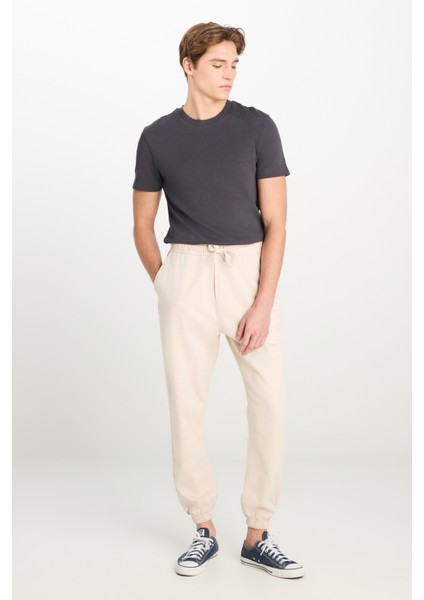 Regular Fit Normal Kesim Ribanalı Paça Taş Rengi Jogger Pantolon fiyatları