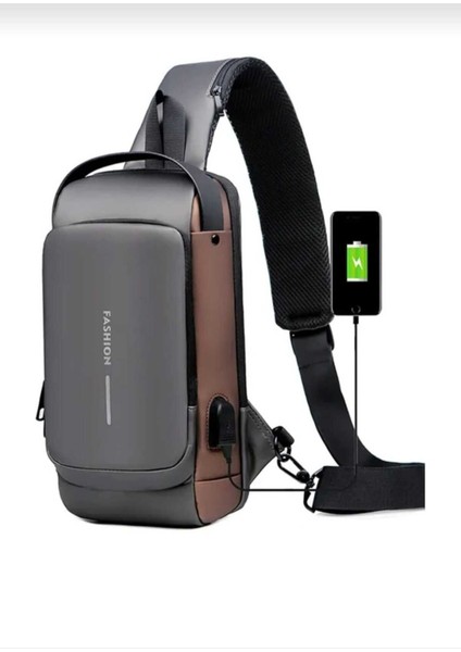 Şık omuz çantası, USB portu, kilitli, siyah gold detaylı, suni deri materyal