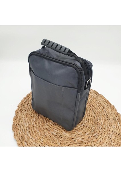 Haki renk yatay fermuarlı orta boy erkek el çantası, şık ve kullanışlı tasarım modelleri