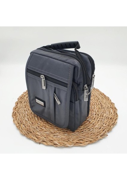 Haki renk yatay fermuarlı orta boy erkek el çantası, şık ve kullanışlı tasarım fırsatları