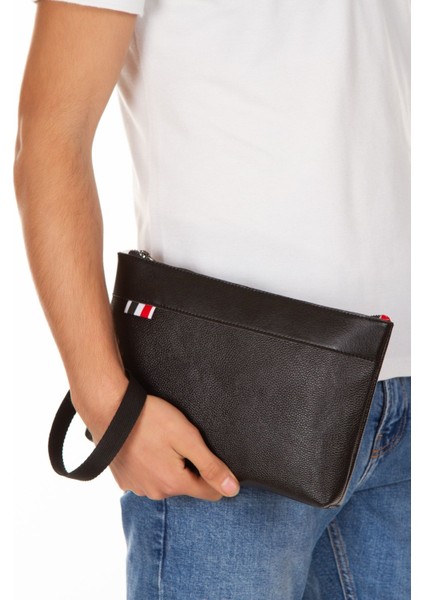 Şık ve kullanışlı orta boy el çantası, suni deri, bilek askılı, siyah renk modelleri