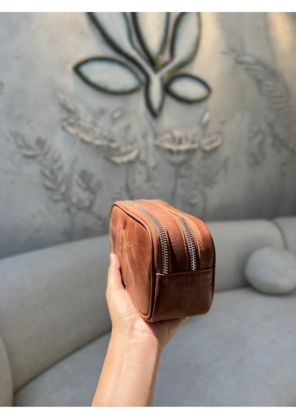 Şık ve doğal deri el çantası, günlük kullanım için sade ve zarif orta boy kahverengi ürün modelleri