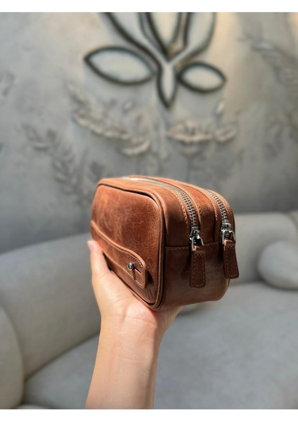 Şık ve doğal deri el çantası, günlük kullanım için sade ve zarif orta boy kahverengi ürün indirimleri