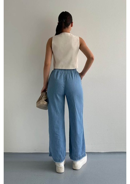 Paçası Püsküllü Straight Fit Mavi Kadın Jean Pantolon 25Y0416K1 fiyatları