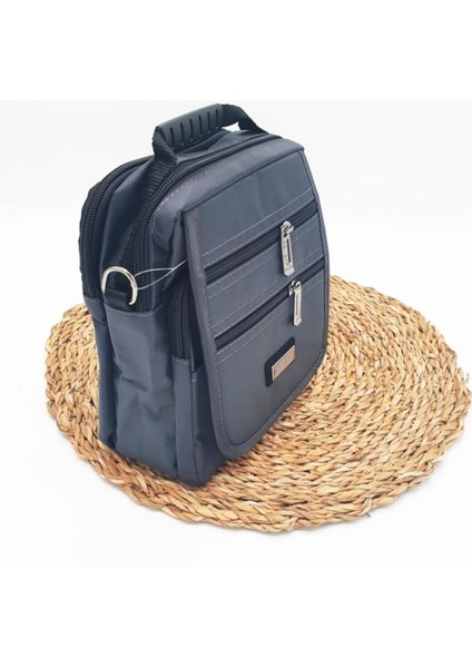 Haki renk orta boy yatay fermuarlı erkek el çantası, şık ve kullanışlı tasarım indirimleri