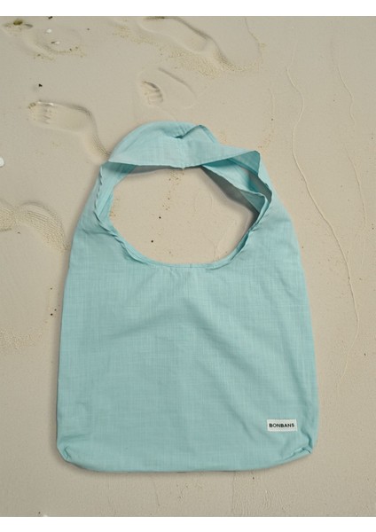 Şık ve kullanışlı mavi tekstil omuz çantası, tarzınıza renk katacak.