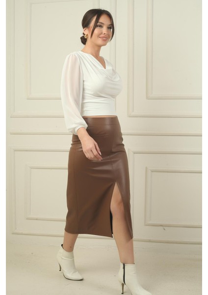 Kadın Önü Yırtmaçlı Cep Detaylı Içi Şardonlu Deri Midi Etek