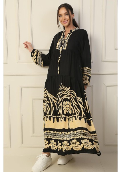 Önü Yarım Düğmeli Kolu Lastikli Empirme Tesettür Uzun Elbise modelleri